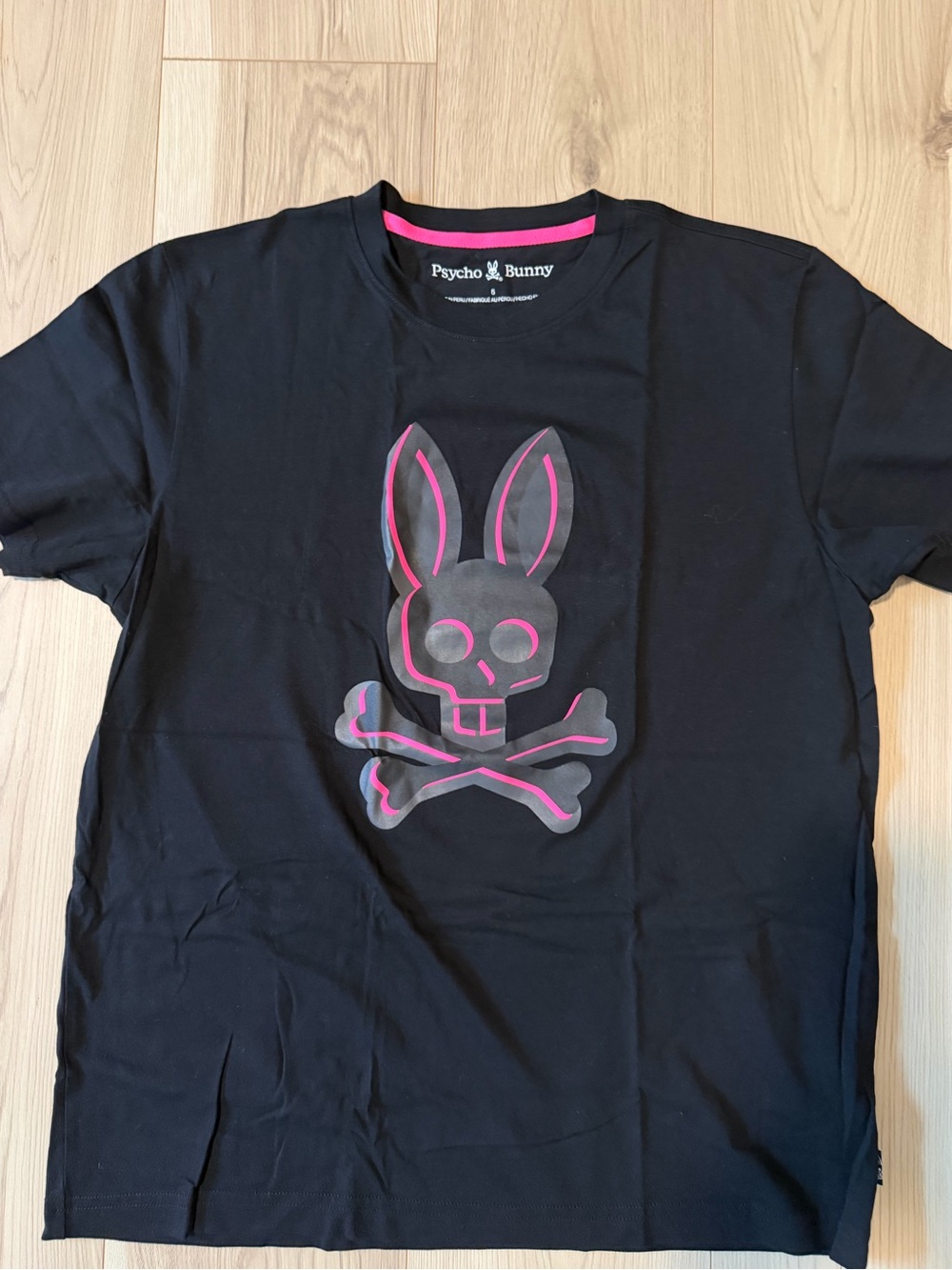 Psycho Bunny Black Tee with Pink-Outlined Bunny Skull